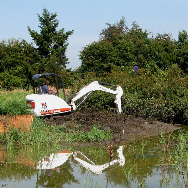 Backhoe Working in Wetland Permitting Featured Image